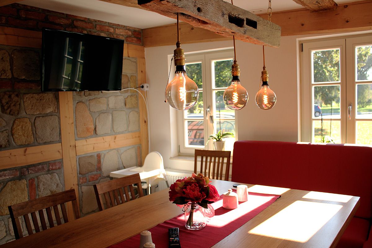 Ferienhaus Schlossblick - Essbereich mit TV