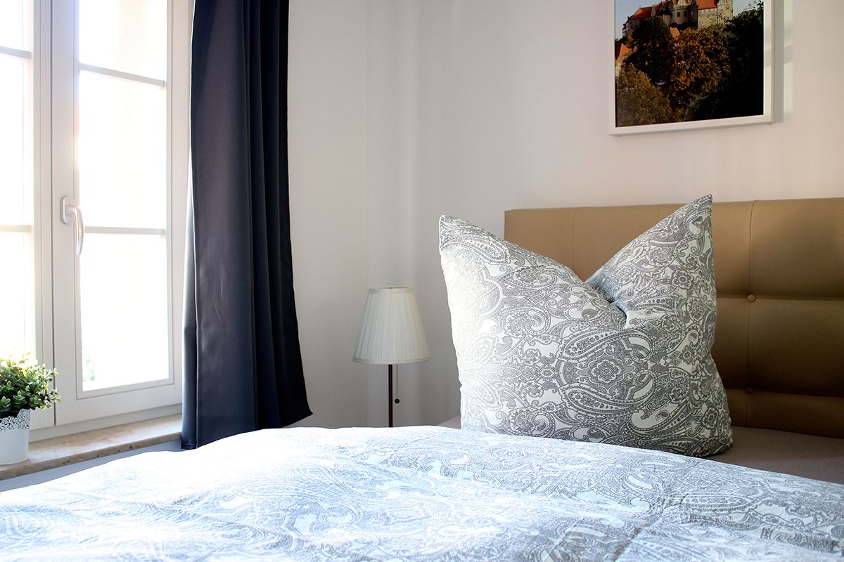Ferienhaus Schlossblick - Schlafzimmer 1 Bett